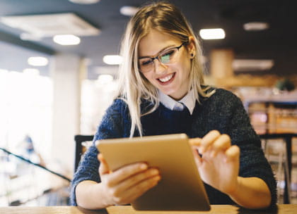 Student revising on a tablet